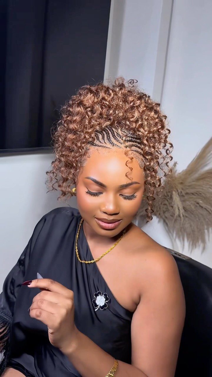 Woman wearing angled cornrows beside voluminous copper-brown curls