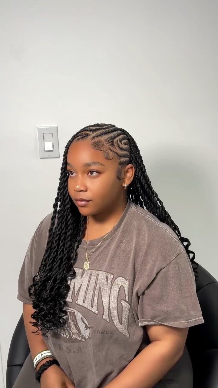 Young woman with long rope twists and neat cornrows along her scalp