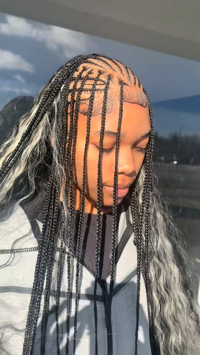 Fulani braids with curved scalp cornrows and long hanging braids