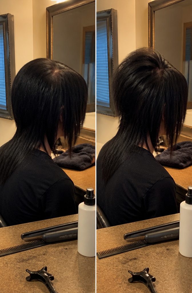 Emo hairstyle with a deep side part and lifted crown